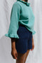 FIORELLA ruffle jumper / organic cotton / turquesa