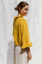 FIORELLA ruffle jumper / organic cotton / golden honey